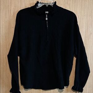 Elegant Black Zip-Up Sweater with Ruffled Neckline